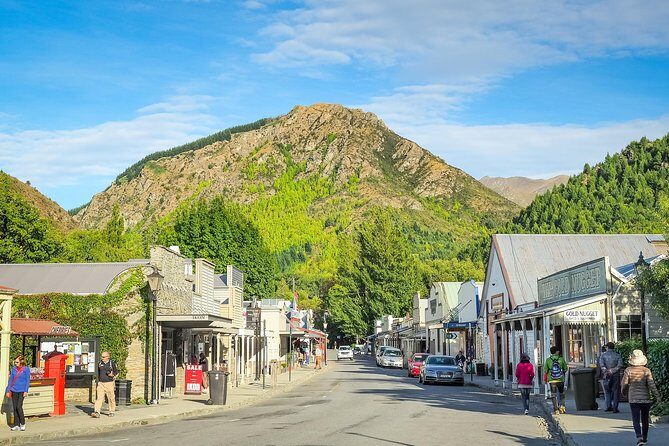 Best of Queenstown Guided Tour with Wine Tasting & Boat Cruise - Shotover River: jet boats, the Edith Cavill Bridge, and real motion