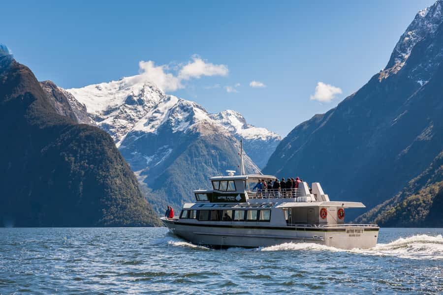 Milford Track: Full Day Guided Hike and Nature Cruise - Weather planning: what to wear so the day stays fun